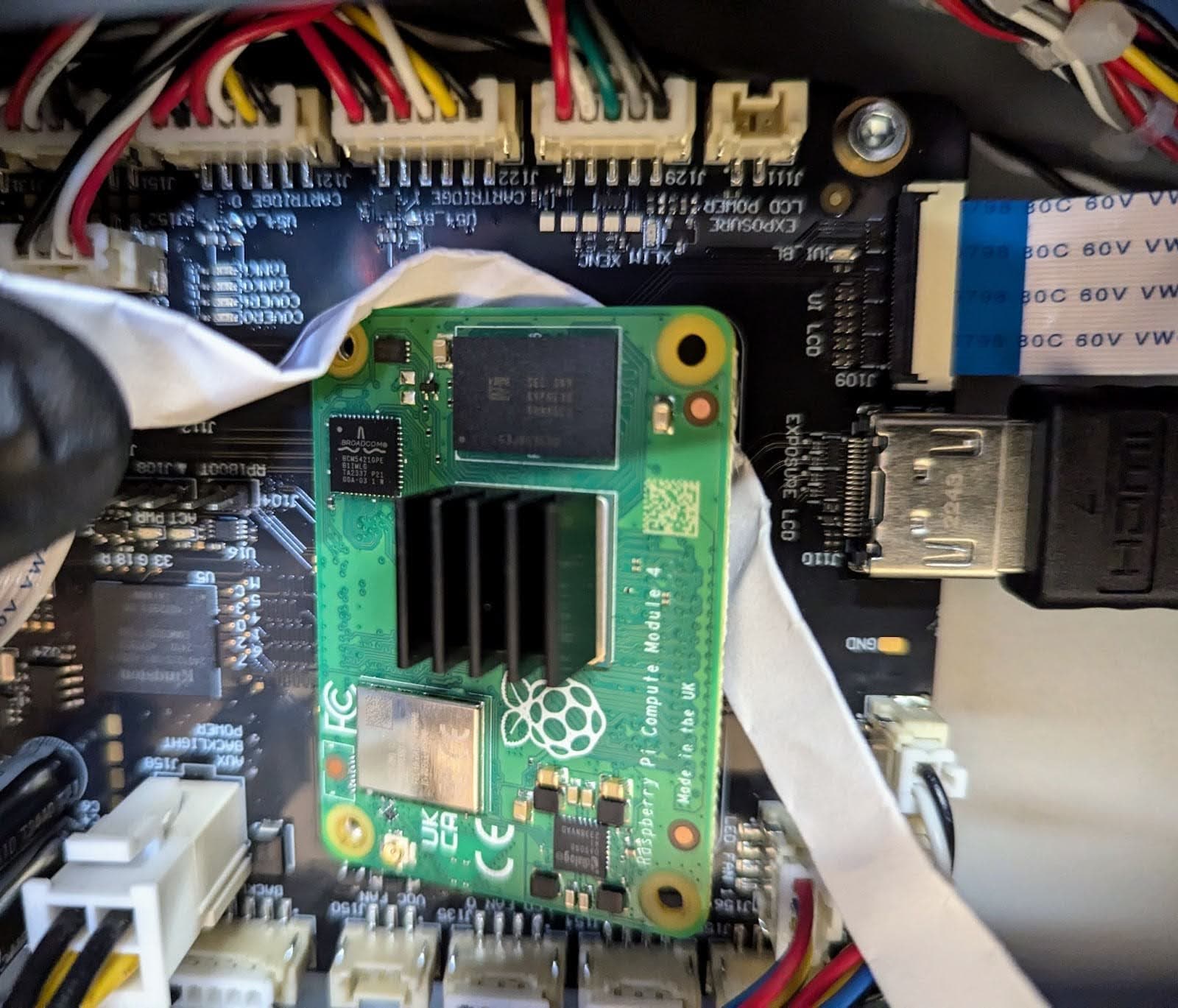 Disconnect the right side of the SOM from the motherboard