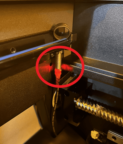 Red light indicating a working tank induction sensor.