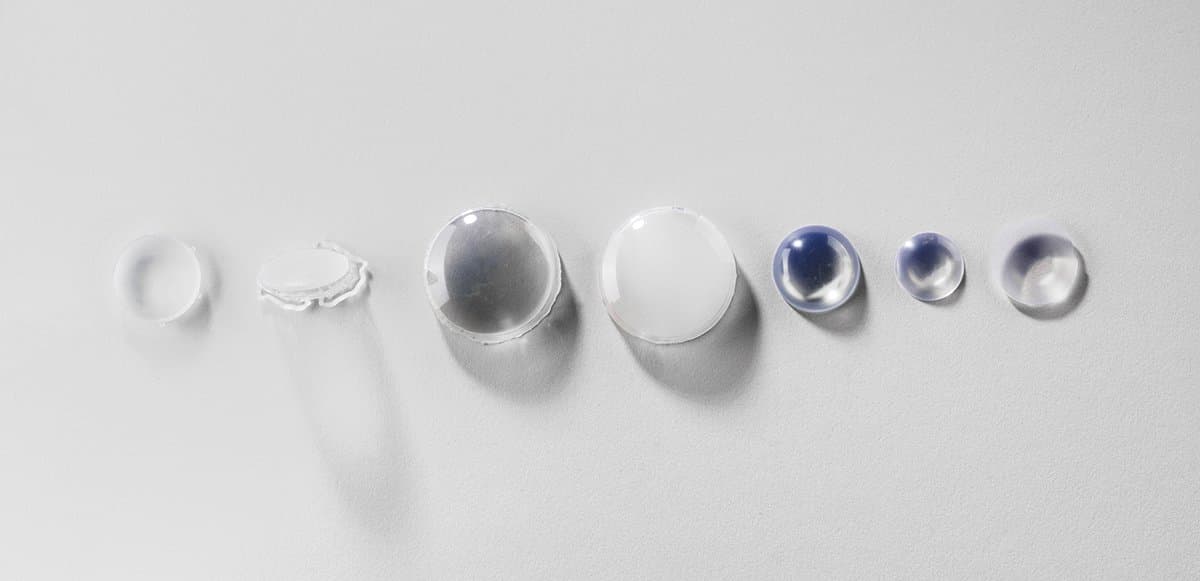 Testing different methods of polishing lenses, including hand sanding and machine polishing.