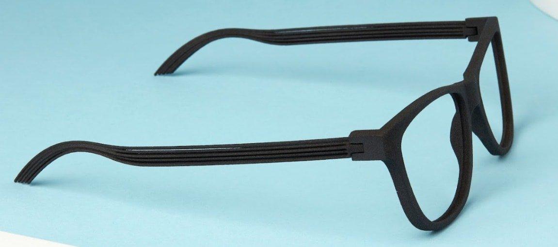 3D printed eyewear assembled with a printed thread and metal screw.