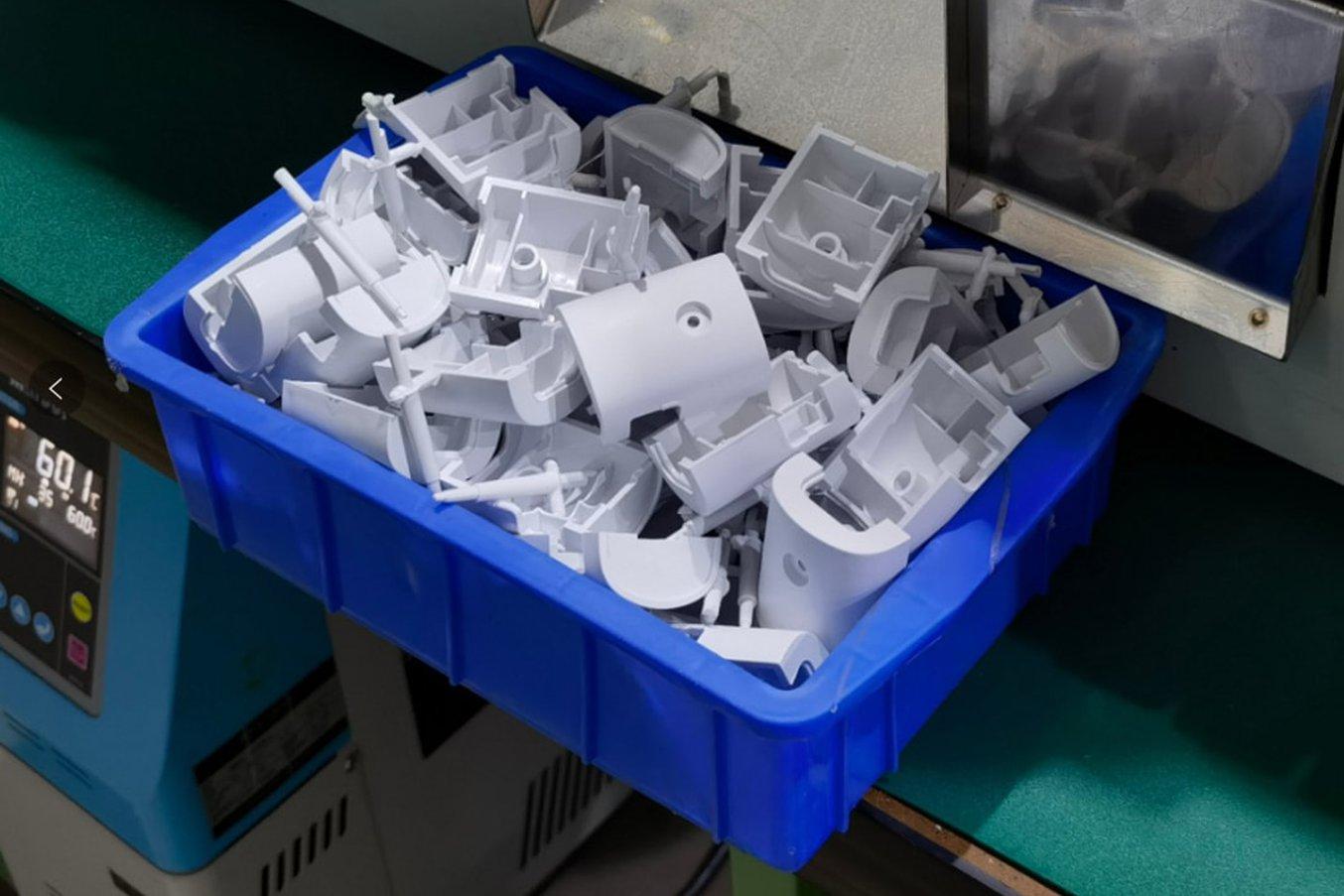 Freshly injection-molded ABS control box housings using the Rigid 10K molds.