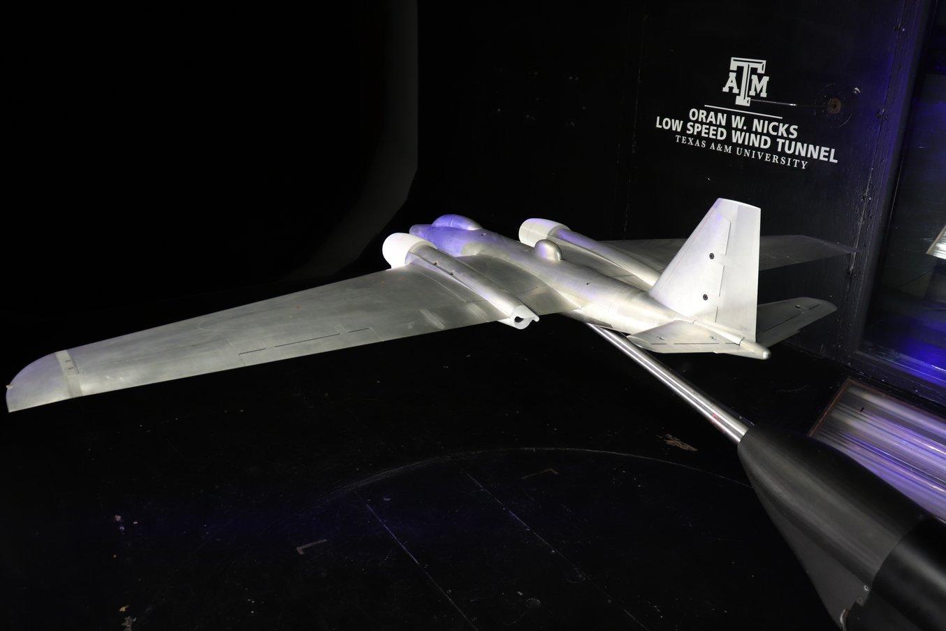 A model plane incorporating 3D prints in a wind tunnel.