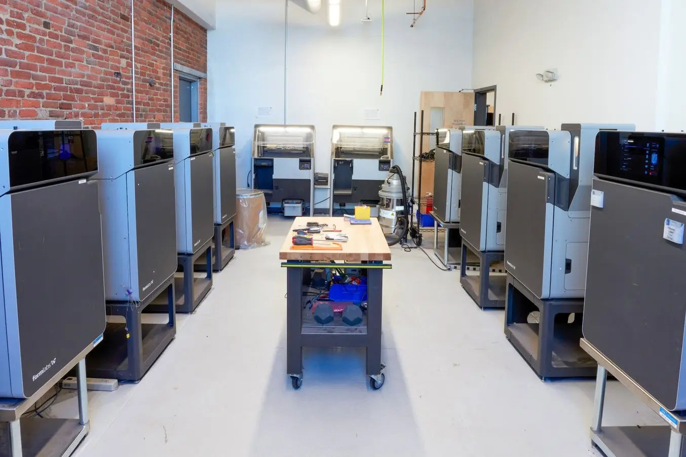 several Fuse printers in a room