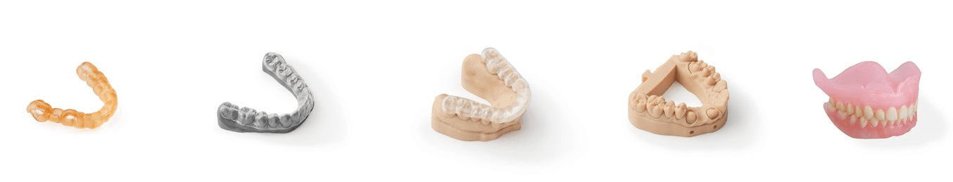 Un ensemble de produits dentaires fabriqués par la technique d'impression 3D stéréolithographique.
