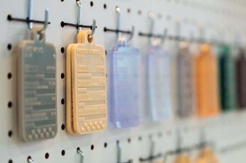 Formlabs material swatches hanging on a peg board