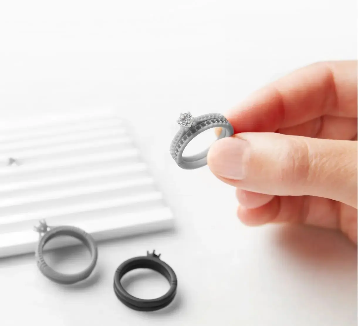 Hand holding ring