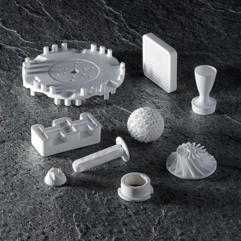 A variety of engineering parts printed in Alumina 4N Resin