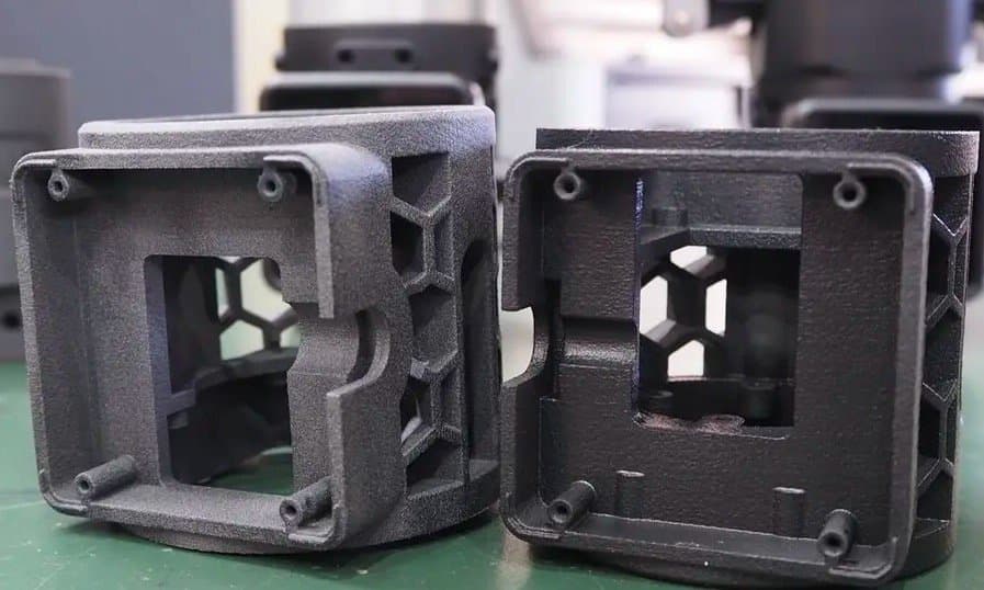 SLS 3D printed end of arm tooling component, gripper, by ARMA with optimized geometry