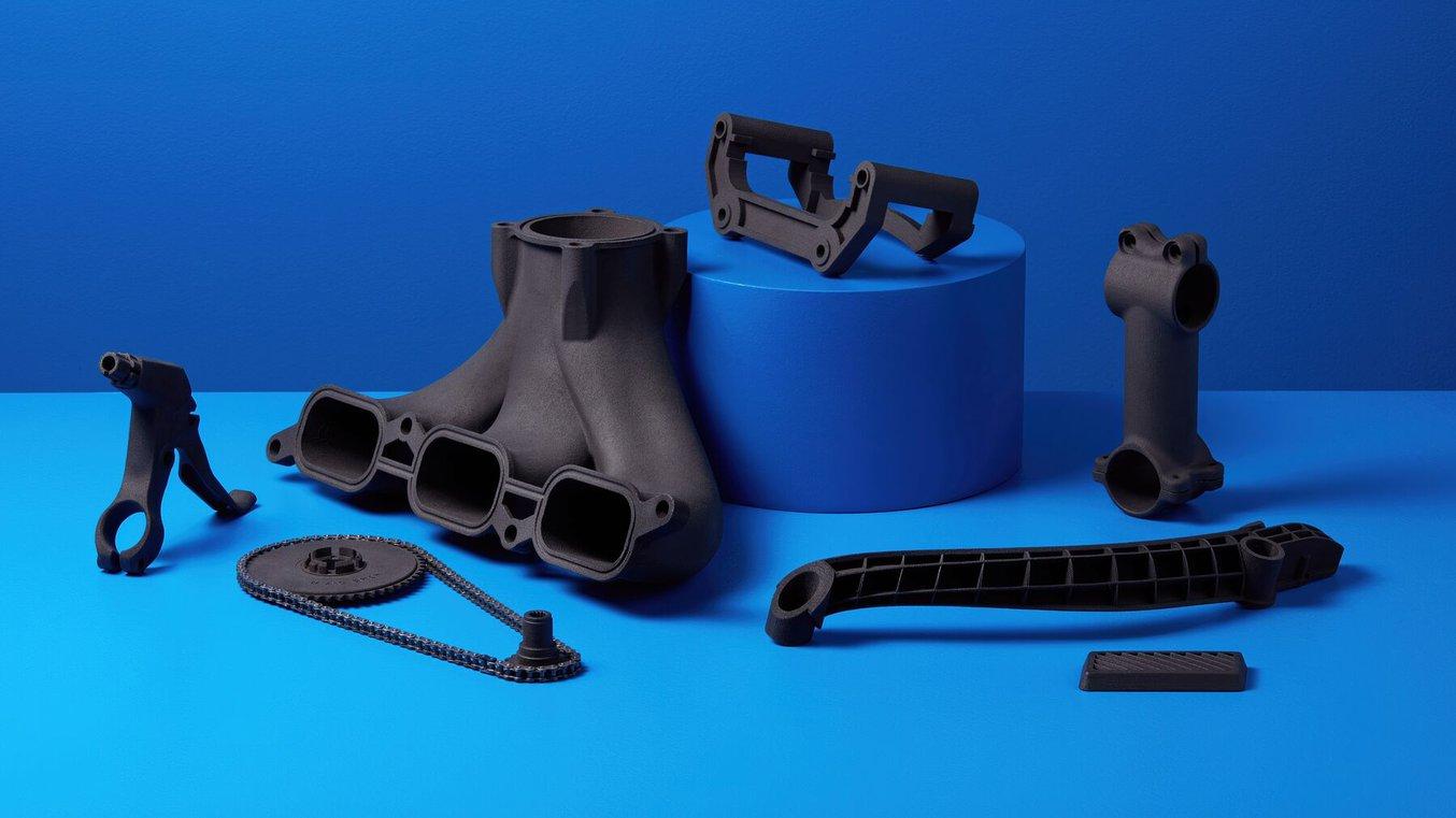Several carbon fiber 3D printed engineering parts, made with Nylon 11 CF Powder.