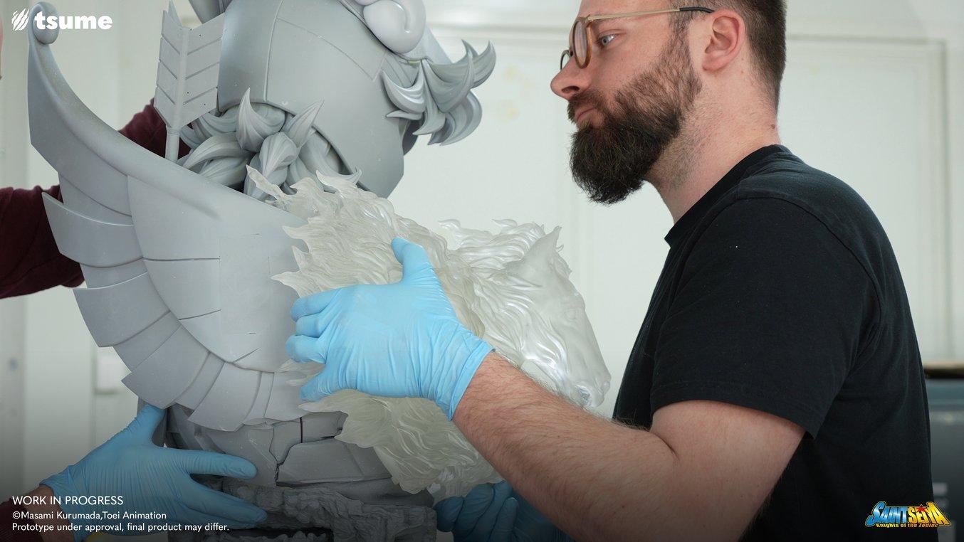 a man working on a 3d printed model