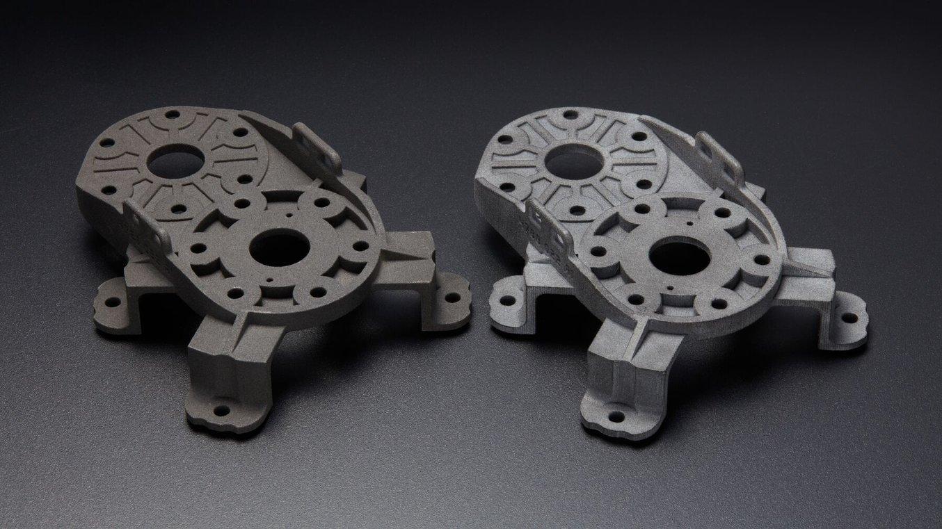 two spider gauge SLS 3d printed automotive components