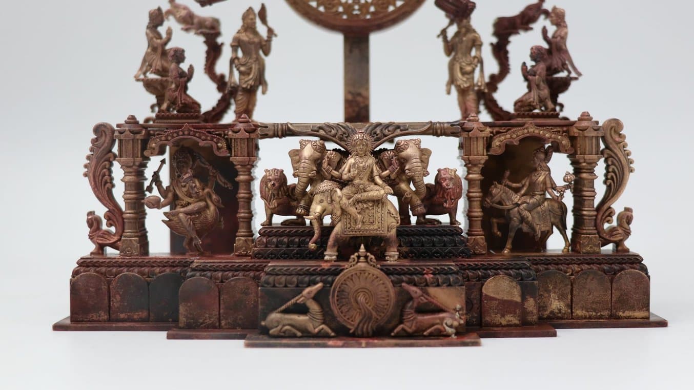 a religious idol casted in brass