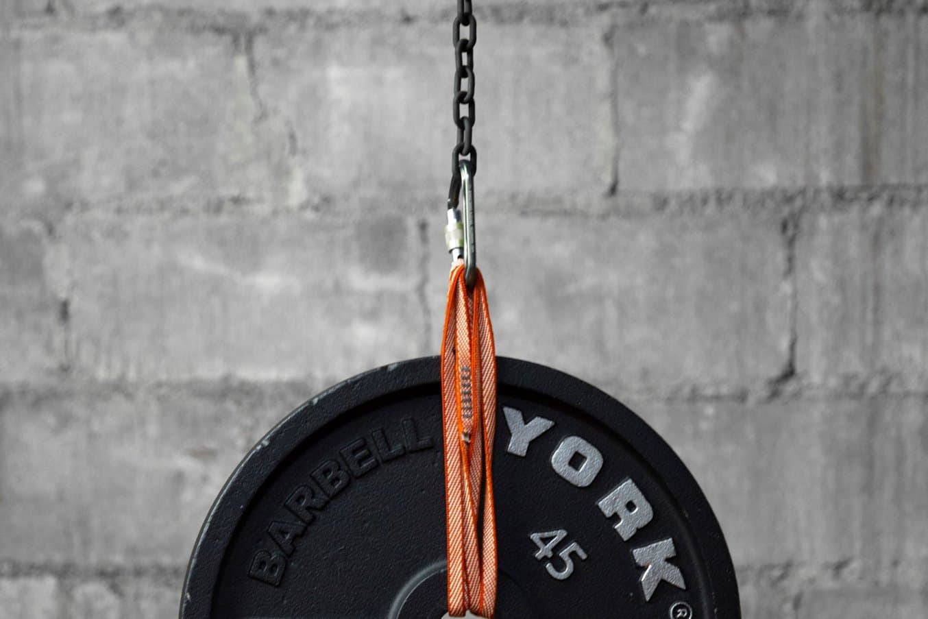 A 3D printed chain holding a 45 pound weight.
