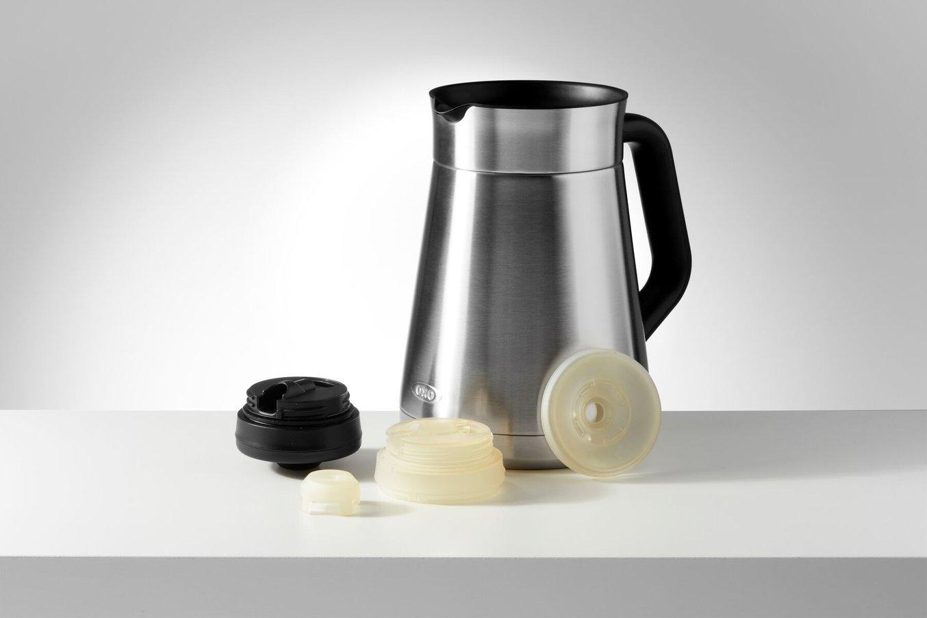 OXO coffee and lid, with 3D printed prototypes of the lid