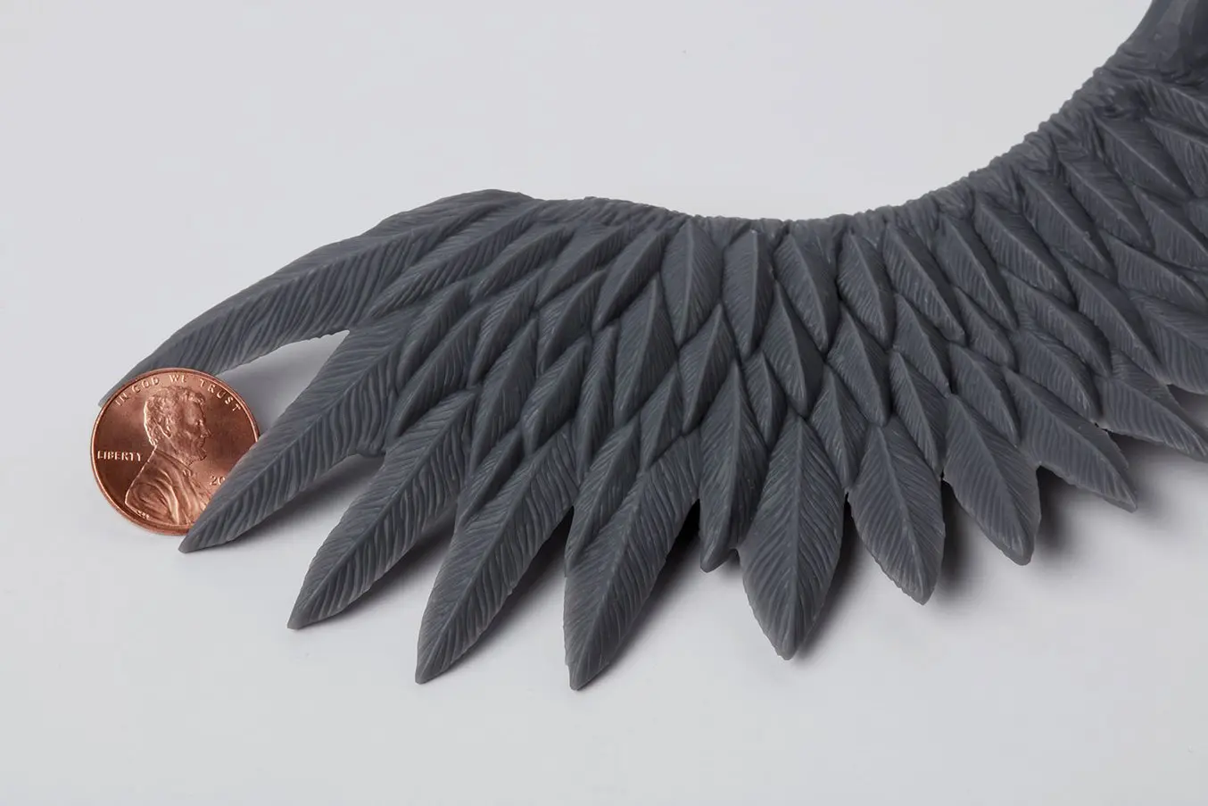 SLA parts have sharp edges, sleek surfaces, and minimal visible layer lines. This example part was printed on the Formlabs Form 3 desktop SLA 3D printer.