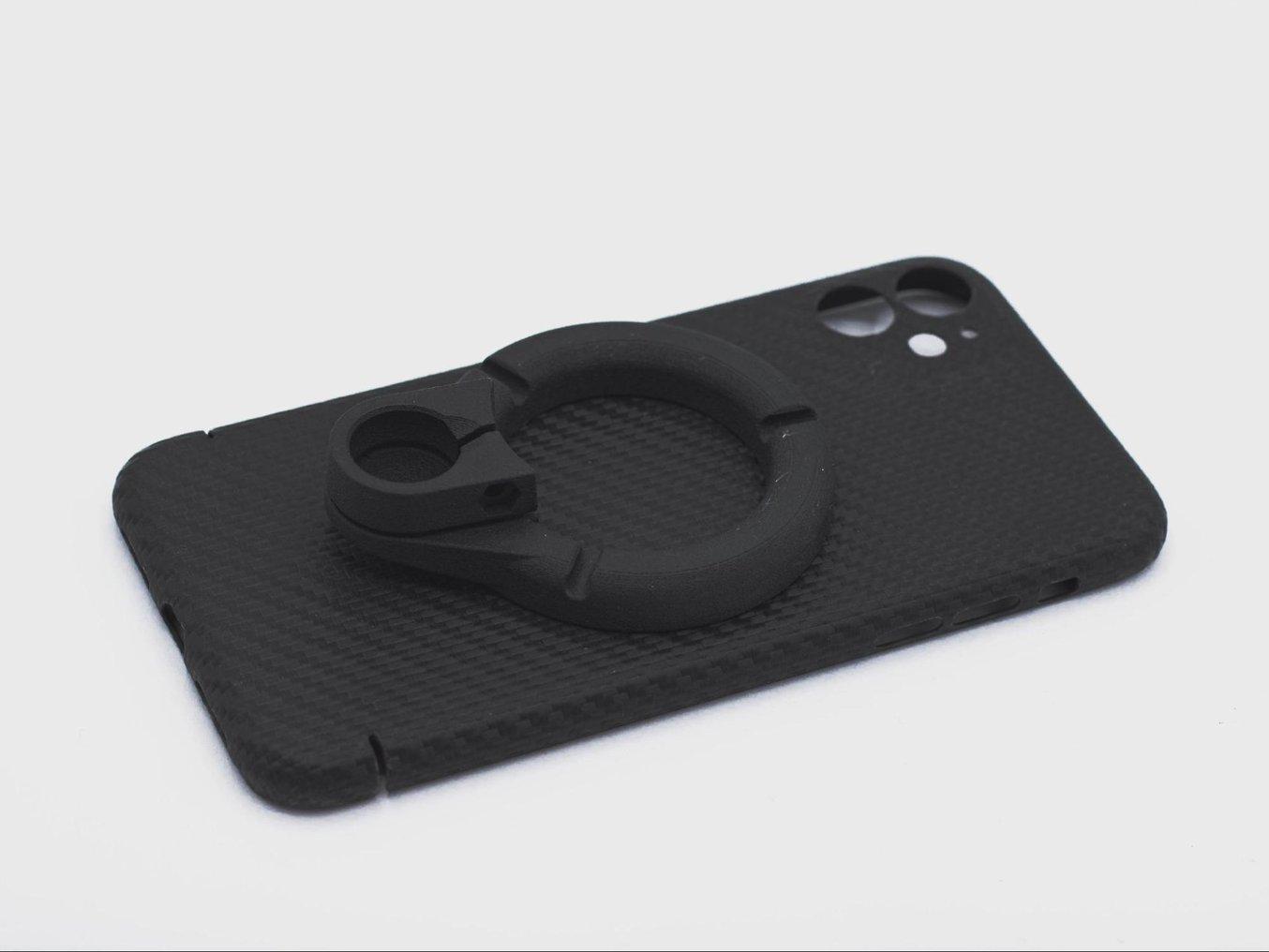 Ring-shaped mobile phone mount by Filono printed using Nylon 12 in small series.