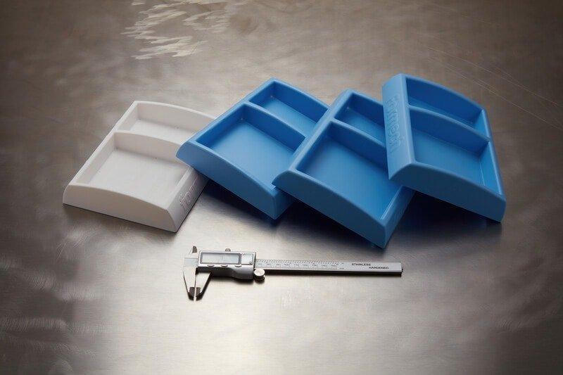 3D printed molds for vacuum forming packaging made with Rigid 10K Resin.