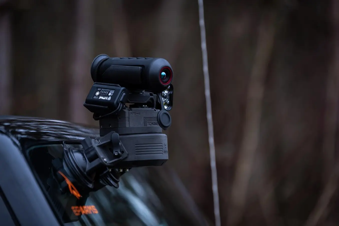 Night vision camera mounted on the exterior of a vehicle.