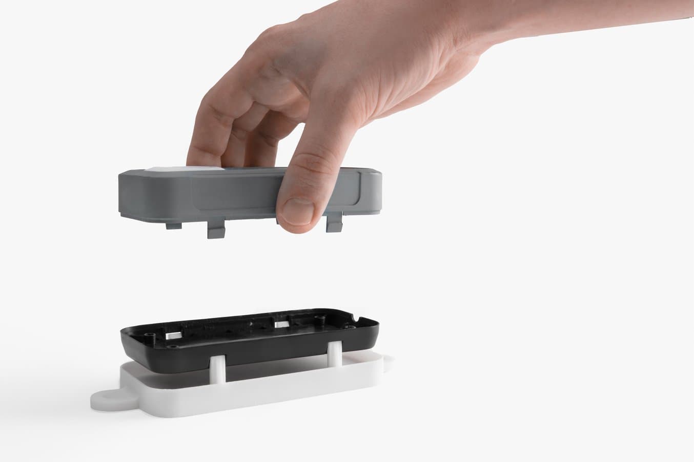 Disassembly jig for separating a snap-fit enclosure in Formlabs White Resin.