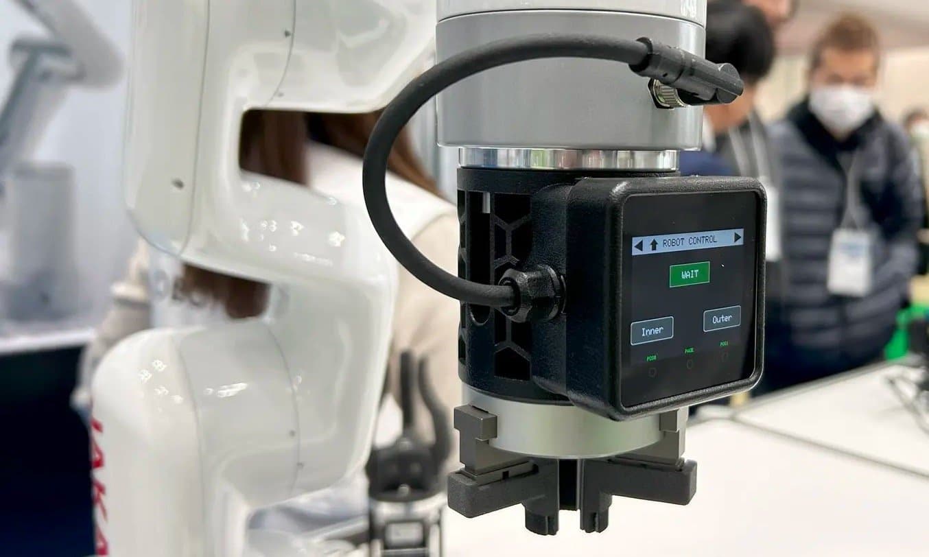 SLS 3D printed end of arm tooling EOAT component on a robot, SLS 3D printed gripper