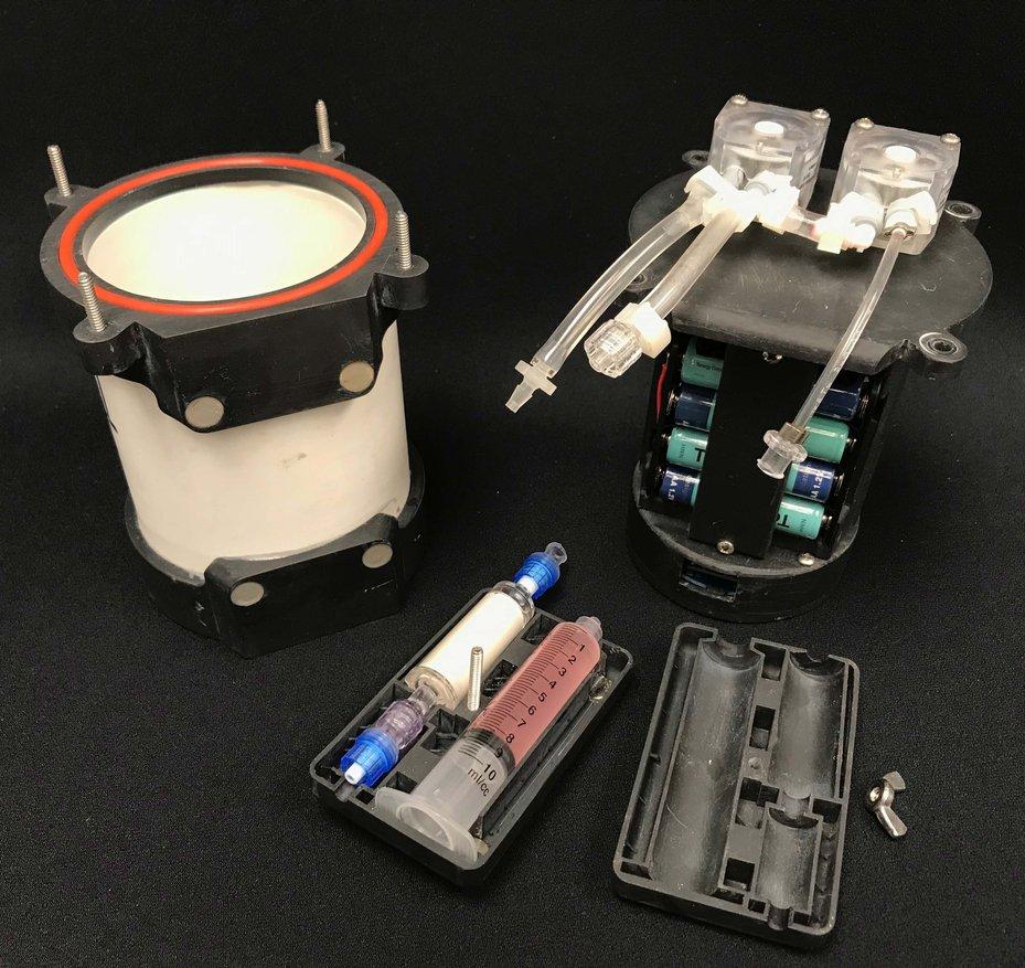 Subsurface Automated Sampler for eDNA (SASe) with SLA end-caps, sample cartridge, and internal armature.