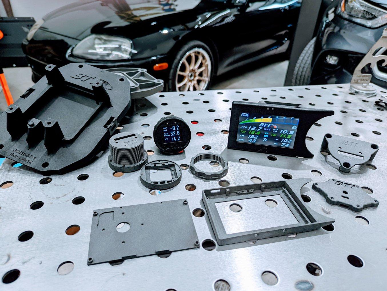 Parts for BTI Gauges aftermarket auto gauges printed on the Fuse 1 selective laser sintering (SLS) 3D printer.