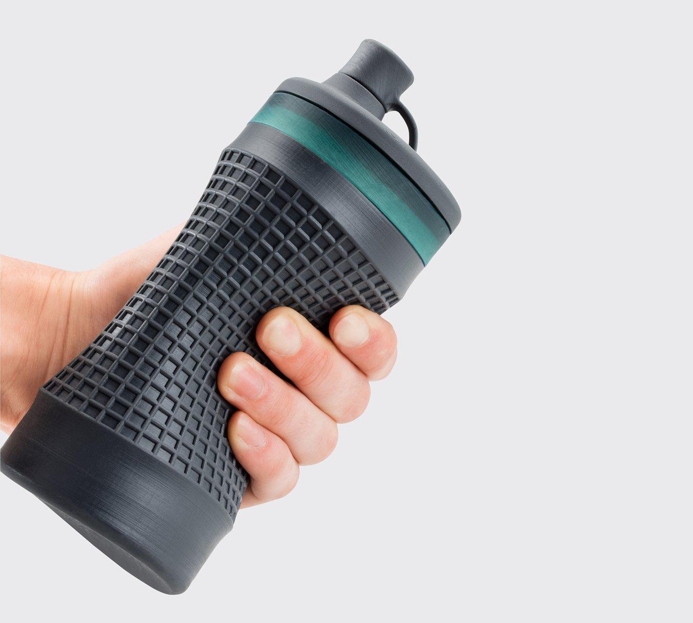 A water bottle prototype 3D printed in Flexible Resin.