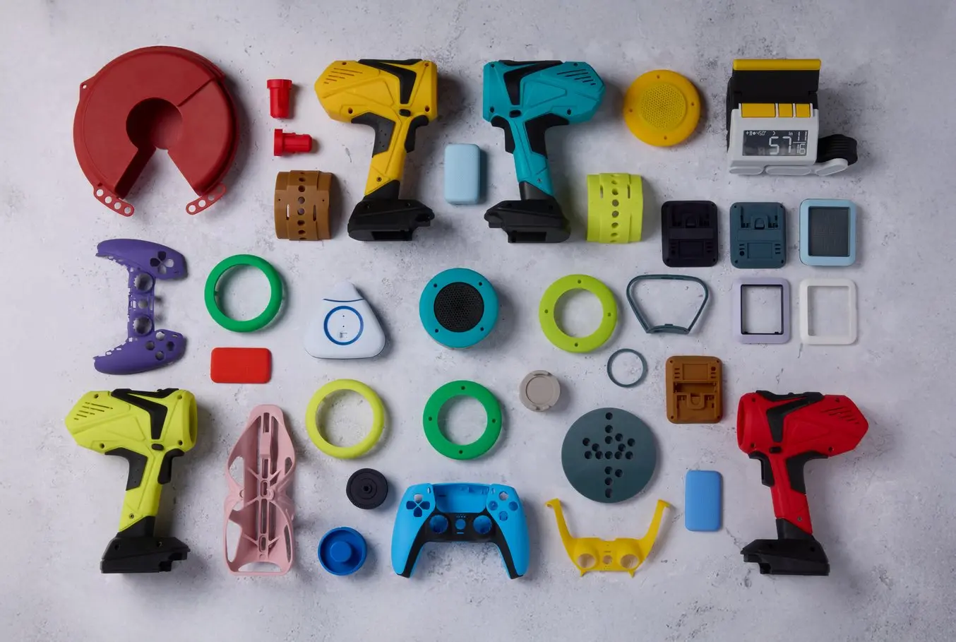 Neatly arranged 3D printed parts in a number of colors