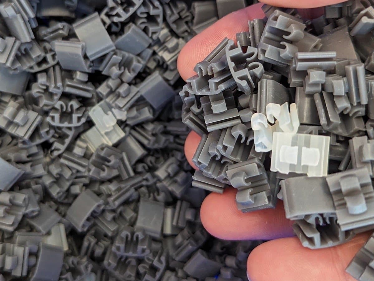 many small parts in a person's hand