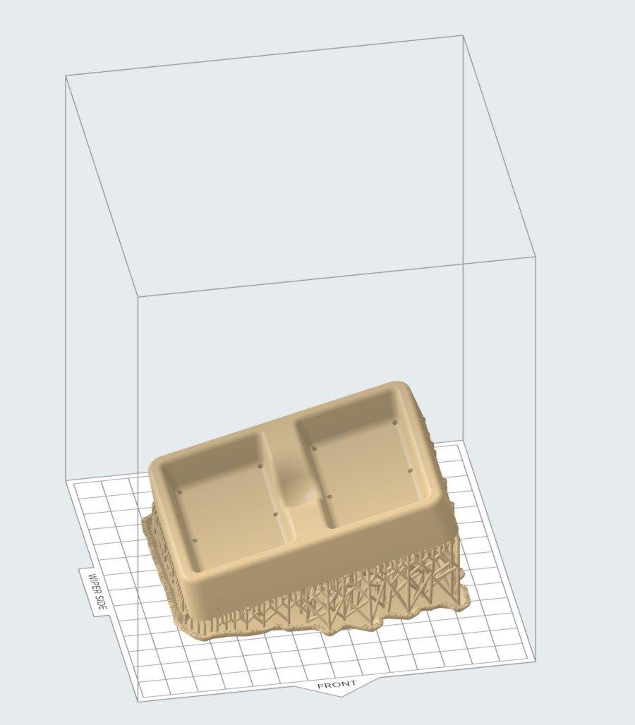 Un ejemplo: una pieza con soportes de impresión en la parte inferior del objeto.