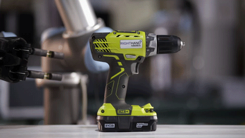 RightHand Labs' ReflexHand grips and lifts a drill.