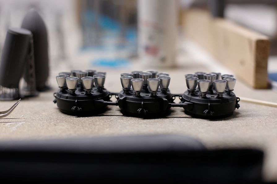 Rocket engines in the works. The parts are printed in Standard Grey Resin, polished, primed, airbrushed, and finally coated to reach their final look.